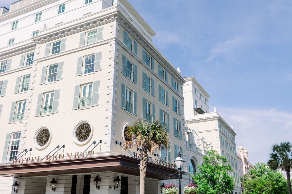 The exterior of the entrance of Hotel Bennett on a sunny day in Charleston, South Carolina.